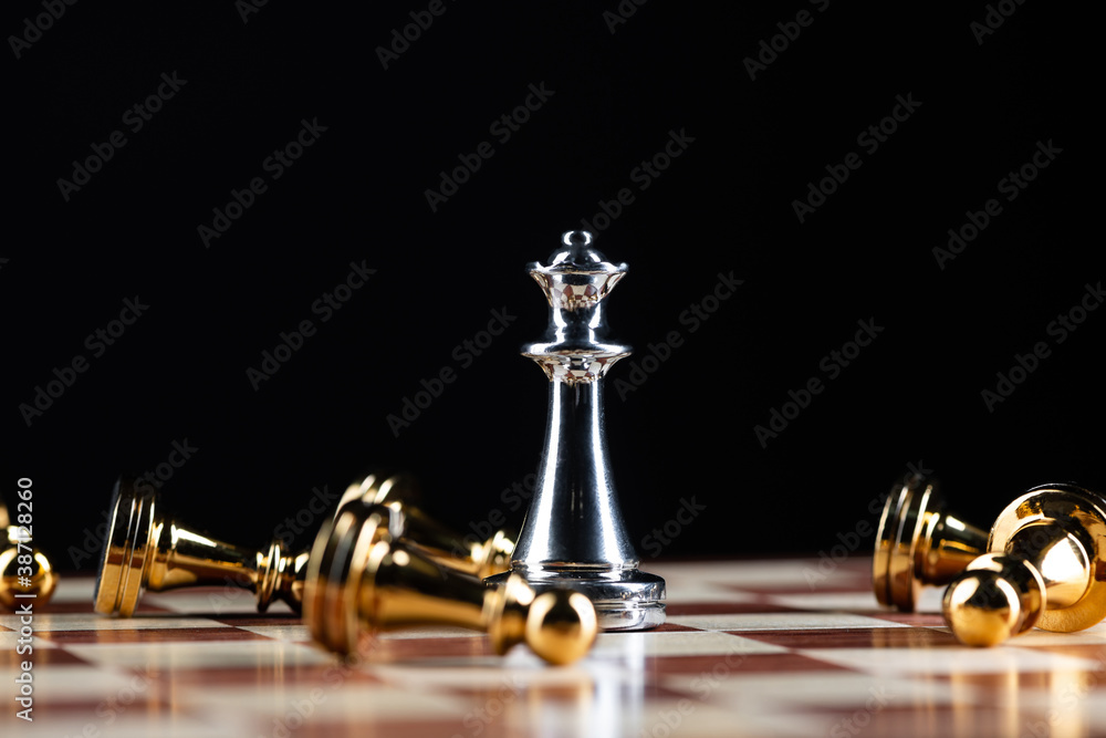 Silver queen chess defeats gold pawns on board.