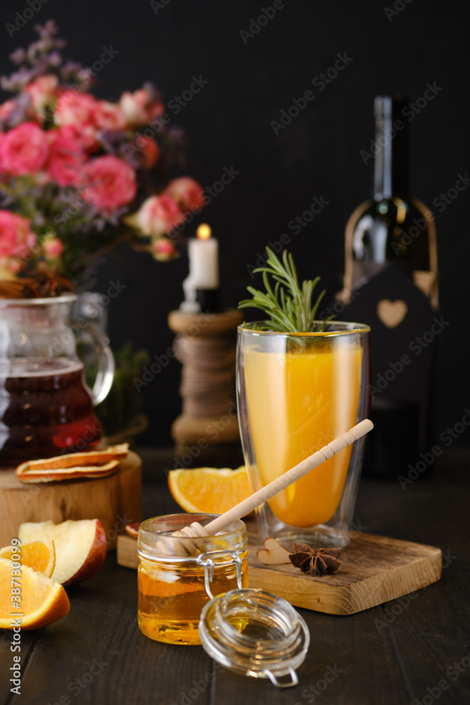 Composition with herbal and fruit hot alcohol drinks with ingredients on the table Composition with herbal and fruit hot alcohol drinks with ingredients on the table