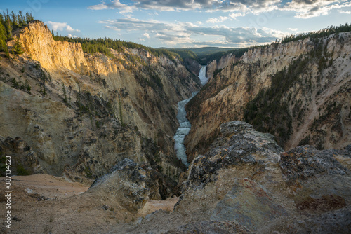 lower falls of the yellowstone national park from artist point at sunset, wyoming, usa