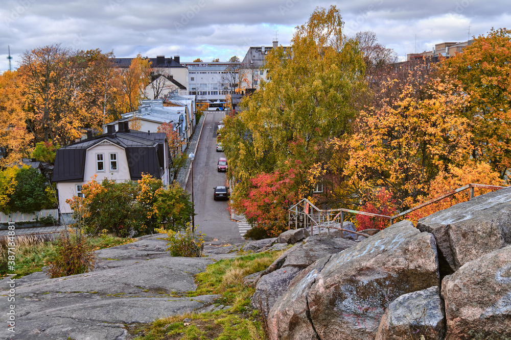 The old wooden district Puu Vallila of Helsinki, Finland. Autumn cityscape.