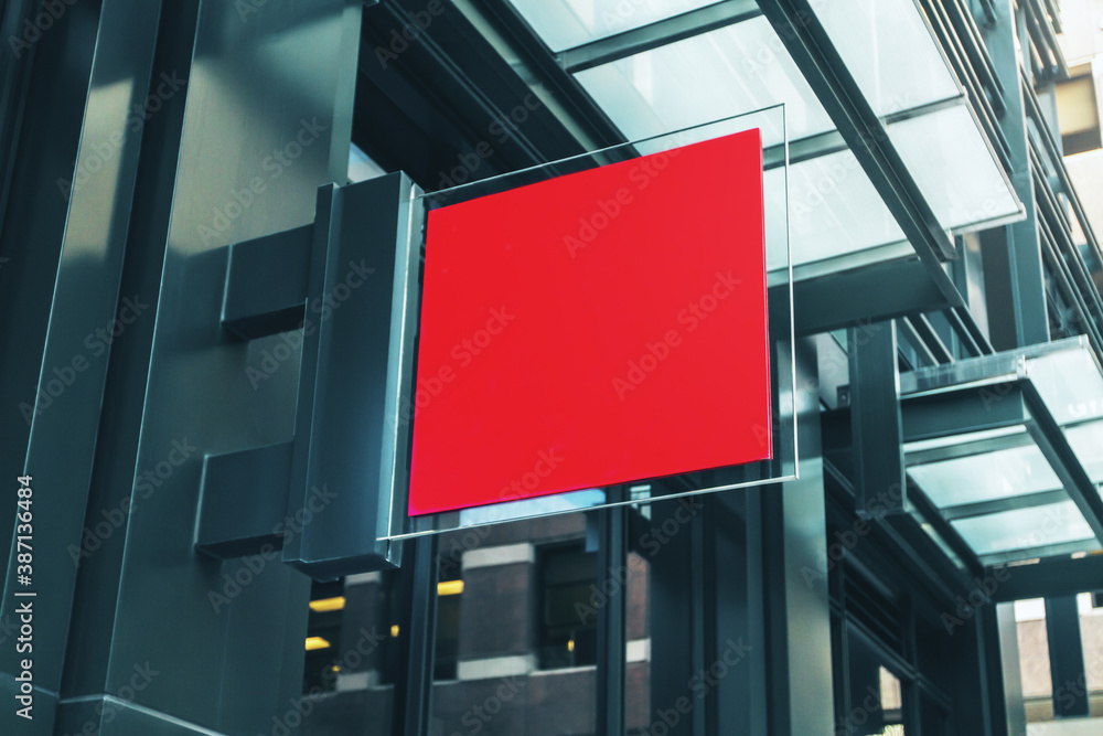 Red square signboard on the wall of a modern shopping mall, mock up - obrazy, fototapety, plakaty 