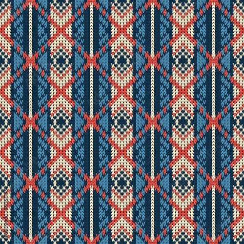 knitted seamless multicolored pattern with rhombus and vertical stripes