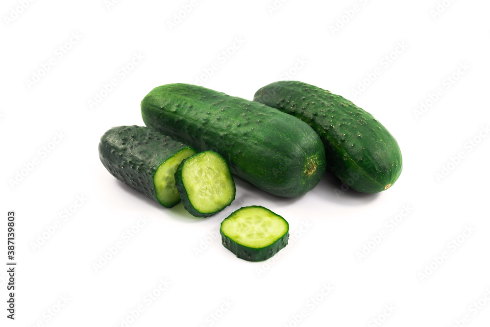 Sliced cucumbers on white isolated background, making up dishes, vegetable