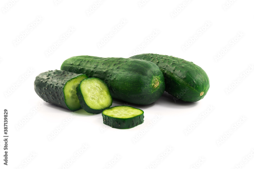 Sliced cucumbers on white isolated background, making up dishes, vegetable Sliced cucumbers on white isolated background, making up dishes, vegetable