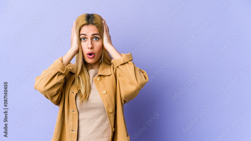 Young blonde caucasian woman being shocked, she has remembered important meeting. Young blonde caucasian woman being shocked, she has remembered important meeting.