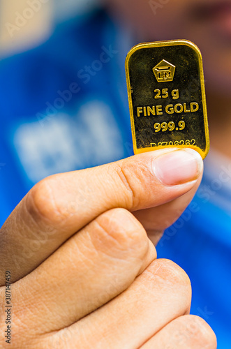 Profile of Fine Gold 25 gram produced by Aneka Tambang, an Indonesian government company  photo