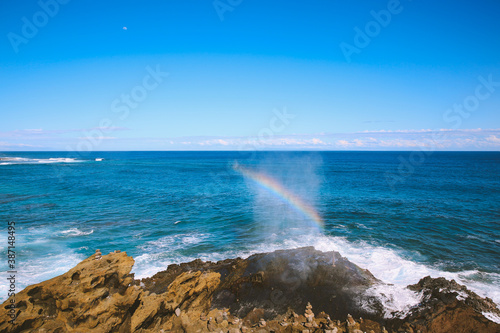Rainbow at Halona Blowhole Lookout, East Honolulu, Oahu, Hawaii  © youli