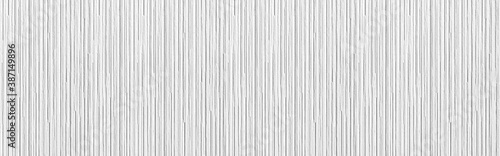 Panorama of Modern white stone wall with stripes texture and seamless background