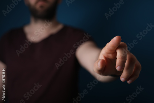 young man touch something w...