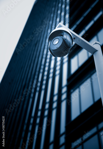 Photography Security surveillance cameras in front of high-rise business district buildings