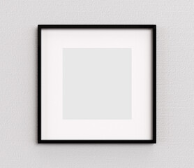 Black square shape picture frame on white wall mockup