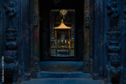there are drums with mantras on a beautiful Buddhist temple in Kathmandu (Nepal).