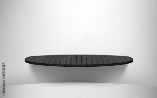 black wooden shelf on the red brick wall	