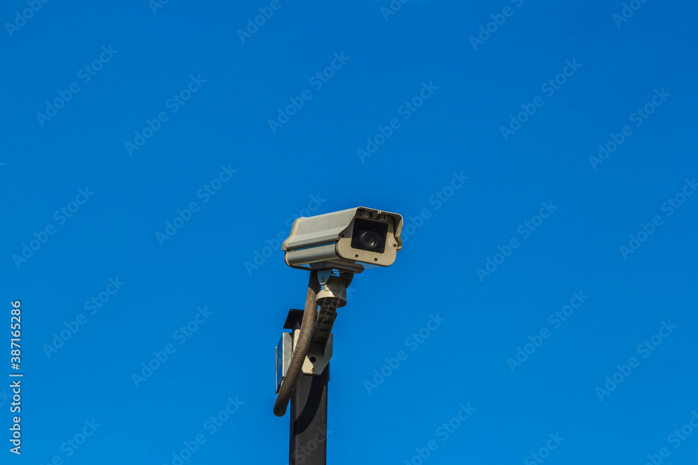 Security camera with blue sky Security camera with blue sky