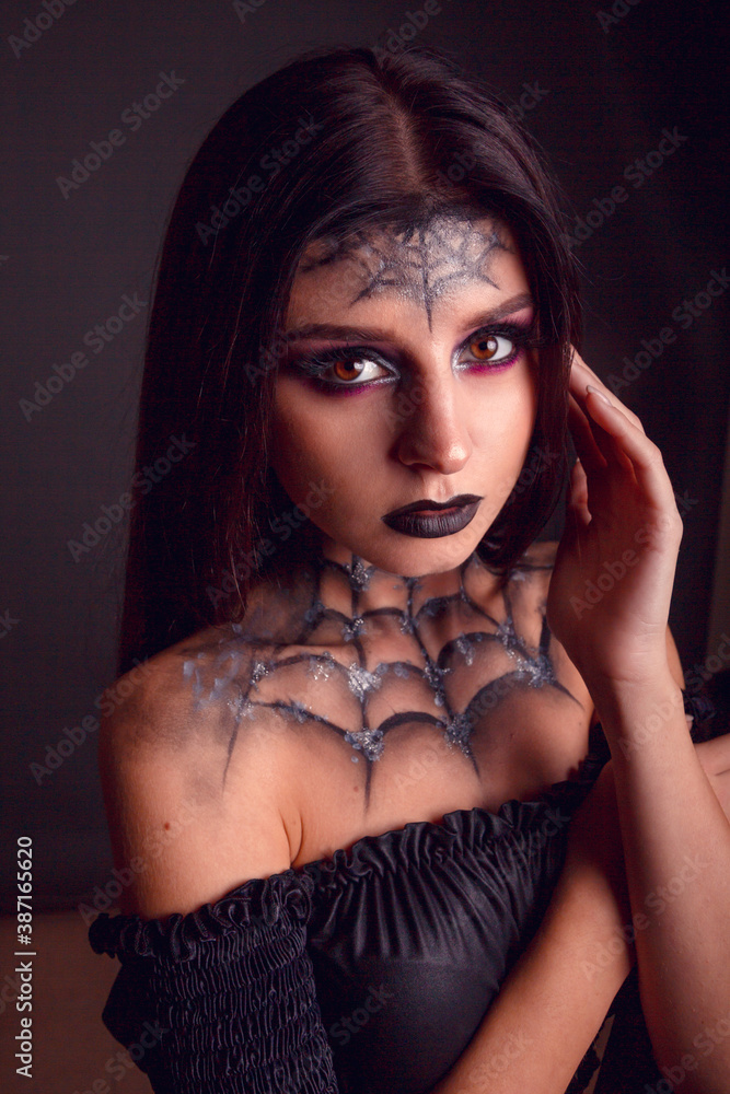 halloween make up spider web close up shot in dark background halloween make up spider web close up shot in dark background
