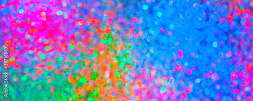 abstract colorful lights for celebration textured glass, blurred