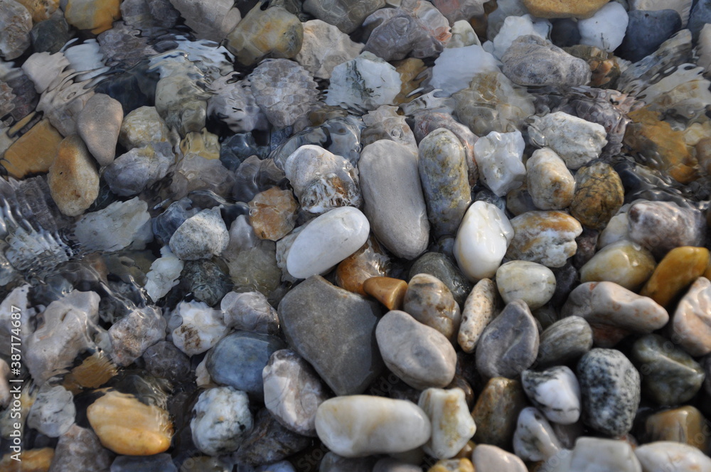 pebbles on the beach. Stones full frame background close up. pebbles on the beach. Stones full frame background close up.