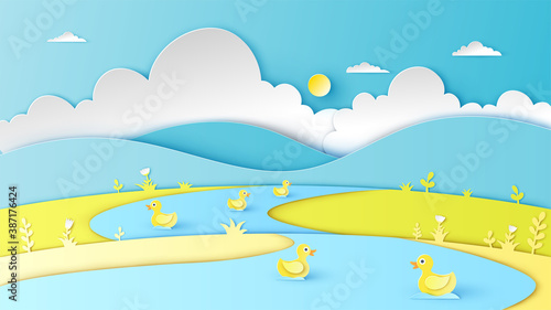 Natural scenery in summer with yellow ducks swimming in the river. paper cut and craft style. vector,illustration.