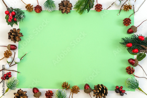 frame beautiful template for text on a green background in a frame of Christmas decor