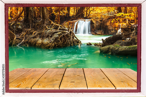 Window framed with beautiful views of the waterfall in front.
