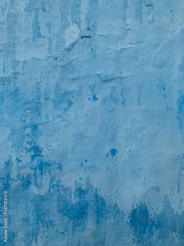 old blue vintage loft wall as a backdrop © dmitriisimakov