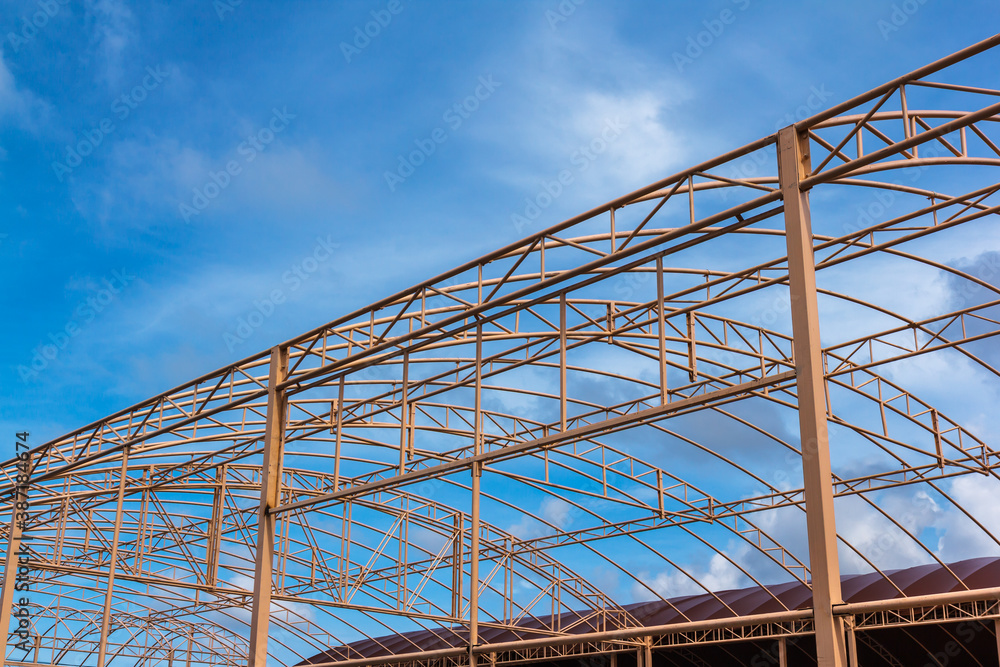 Abstract view of the roof frame supports the sky blue.