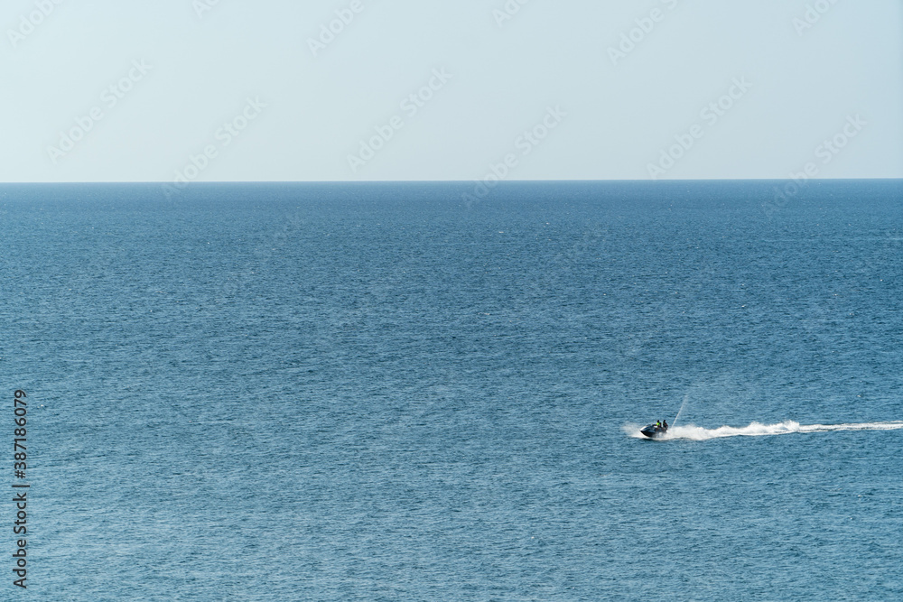 people riding on a jet ski