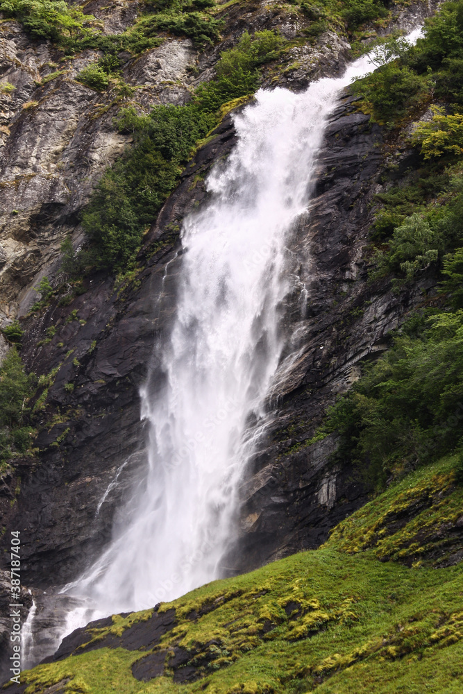 Huge waterfall in Norway falling down the rock