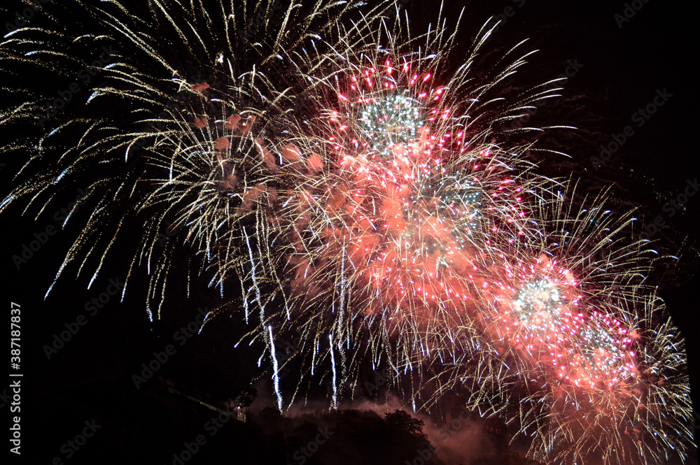 Exploding fireworks display for Christmas and New Year celebration Exploding fireworks display for Christmas and New Year celebration
