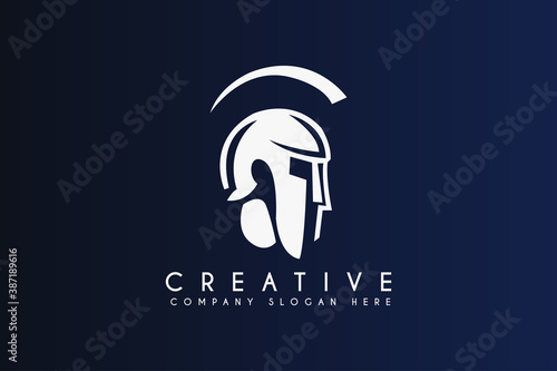 Greek Sparta / Spartan Helmet Warrior logo design vector illustration. Spartan warrior logo isolated on blue background