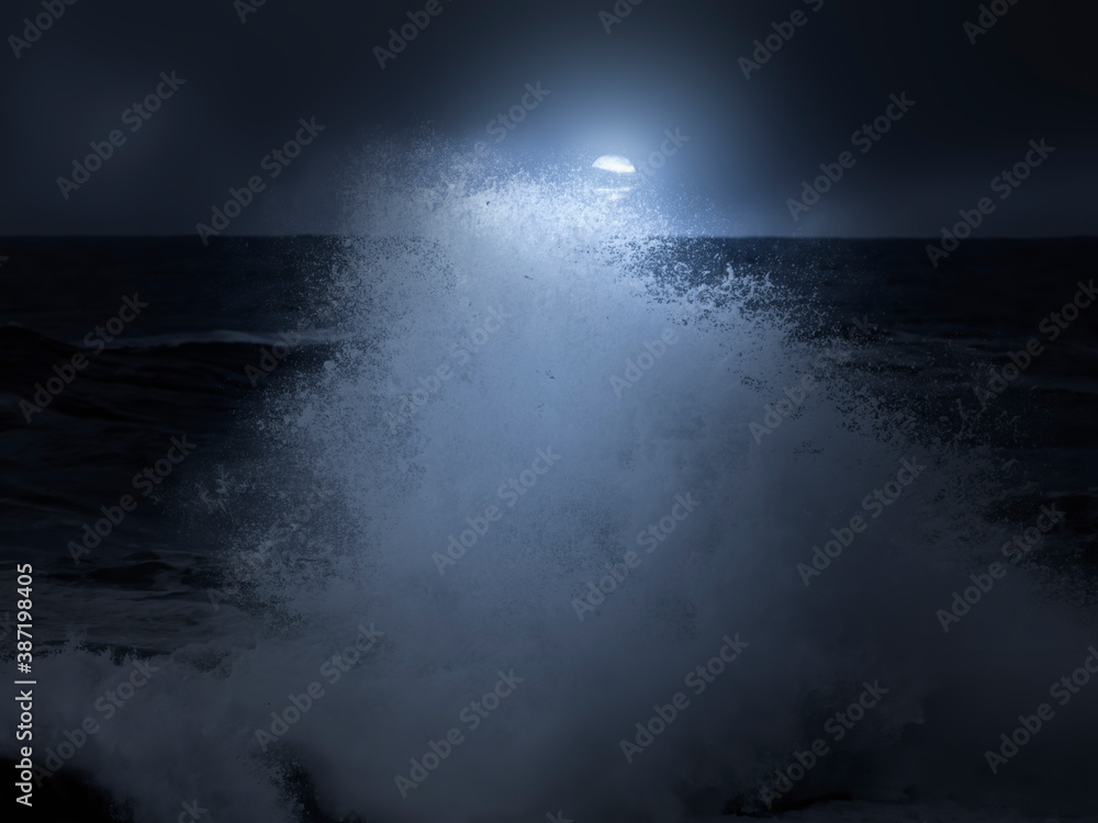 Wave splash in a cloudy full moon night