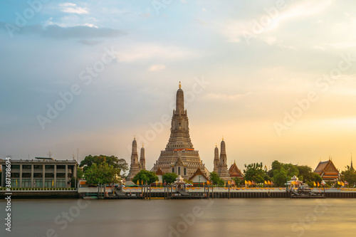 Wat Arun along Chao Phraya River during sunset, a popular place for foreigners visiting thailand to visit, Bangkok, Thailand.