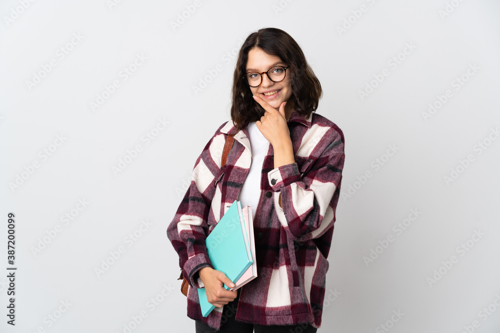 Teenager Ukrainian student isolated on white background happy and smiling Teenager Ukrainian student isolated on white background happy and smiling