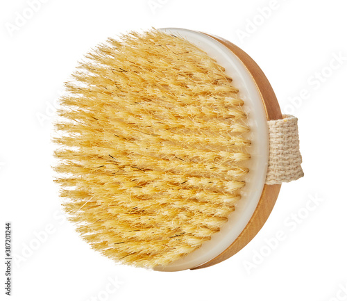 Wooden massager with natural bristle, isolated on white photo