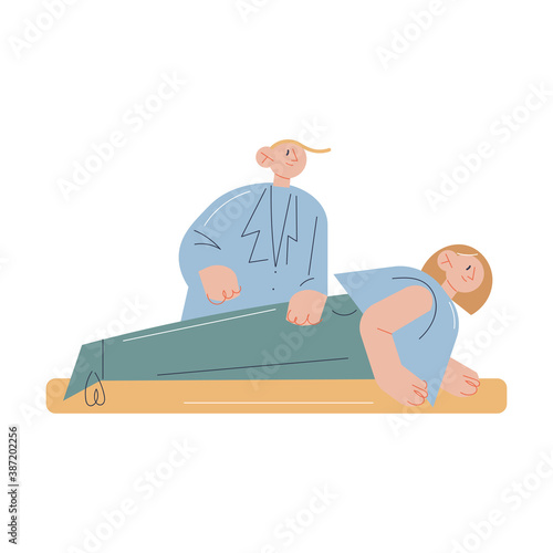 Young man doctor fixing woman patients leg muscles during rehabilitation program