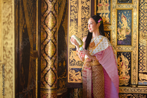 Luxury portrait of a beautiful Thai girl in traditional thai costume, identity culture of Thailand, identity culture of Asia