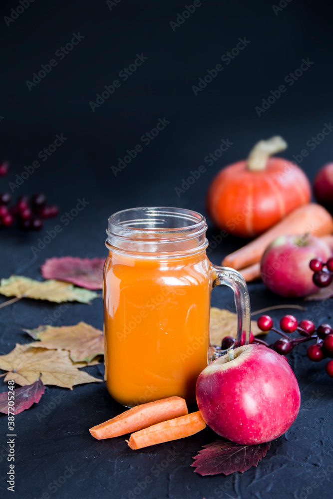 Halloween cocktail, pumpkin orange drink with spices. Dark vintage dirty background. Creative atmospheric decoration Halloween cocktail, pumpkin orange drink with spices. Dark vintage dirty background. Creative atmospheric decoration