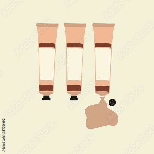 A set of creams or paints in beige