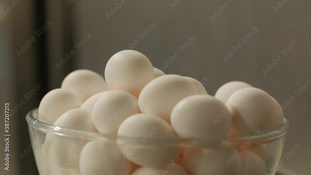 White eggs in glassware push in forward camera movement focus transition White eggs in glassware push in forward camera movement focus transition