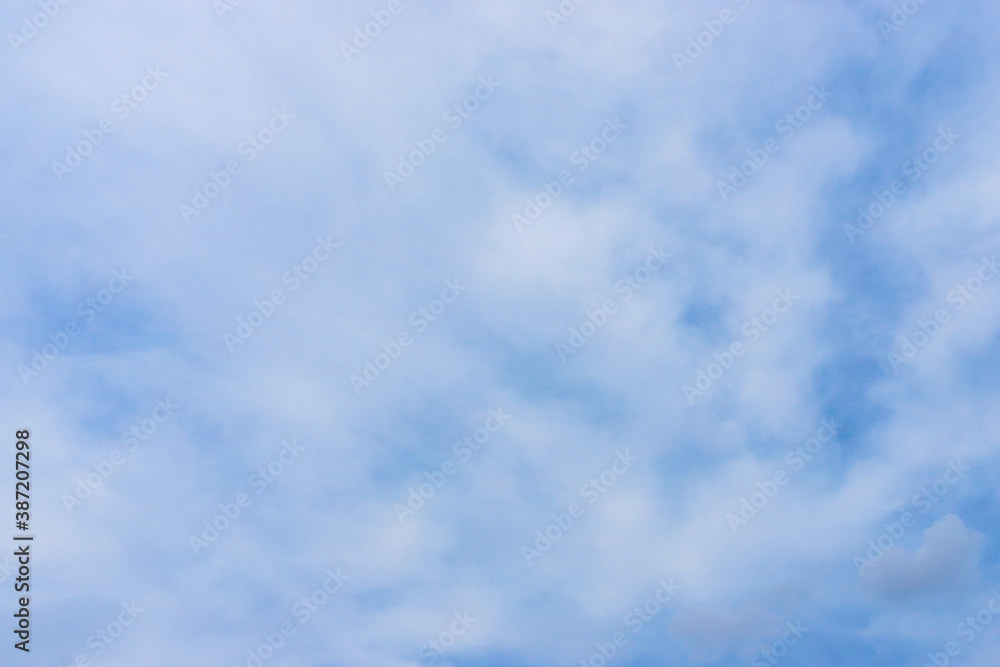 White clouds on a blue sky. White backgrounds