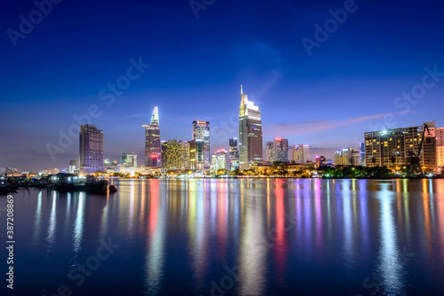 View of Hochiminh city at night from the banks of the Saigon River. Ho Chi Minh City  Vietnam.