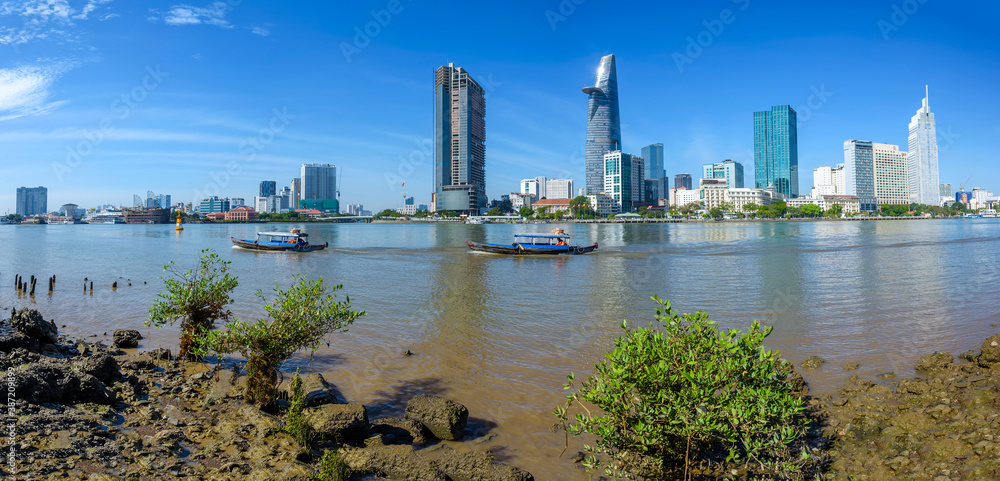 Fototapeta premium Panoramic view of Hochiminh city from the banks of the Saigon River. Ho Chi Minh City, Vietnam.
