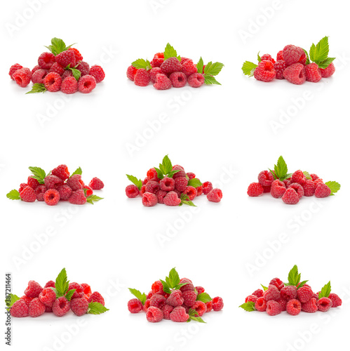 Raspberries collection with leaf isolated on white background © Nana_studio