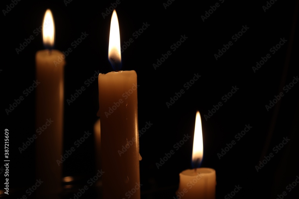 Candle black background of mourning funeral moment of silence Candle black background of mourning funeral moment of silence