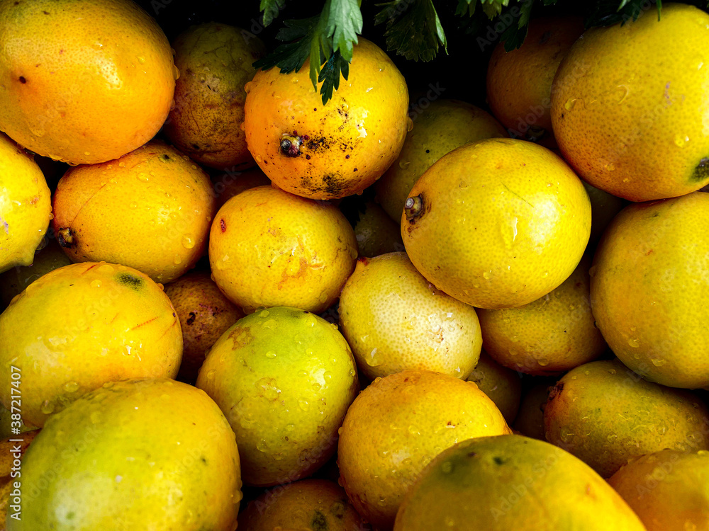 lemons and limes. yellow food.