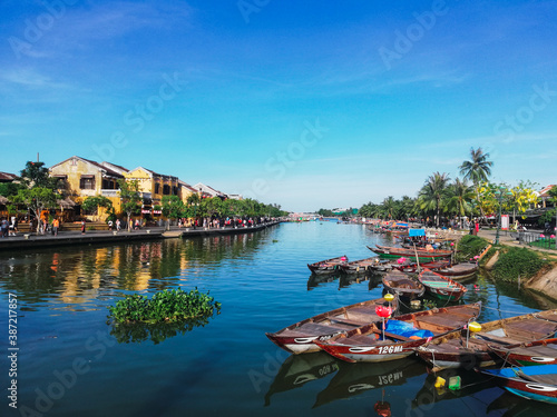 Thu Bon river and boats in Hoi An ancient town, Vietnam