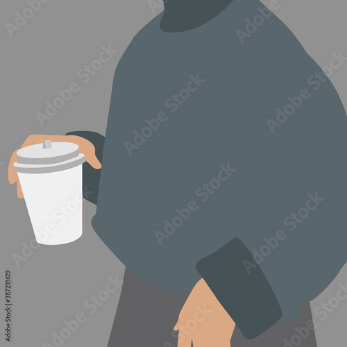 gray sweater on the girl holding coffee