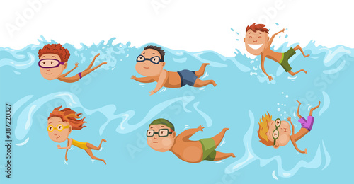 Childrens swimming in pool. Cheerful and active little boys and girls swimming in pool. Boys and girls in swimwear are swimming in a children pool. Underwater view. Sport team
