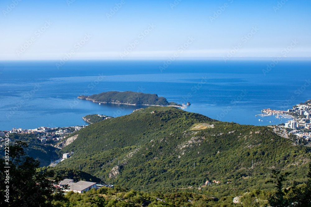 A view from the height of the mountainous area, the city and the sea bay. Adriatic coast. Montenegro