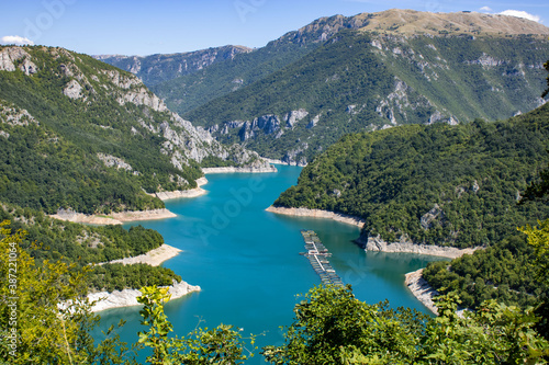  Beautiful landscape Mountain lake of azure color. Oyster farm. View from above. Sunny day, clouds. Montenegro.